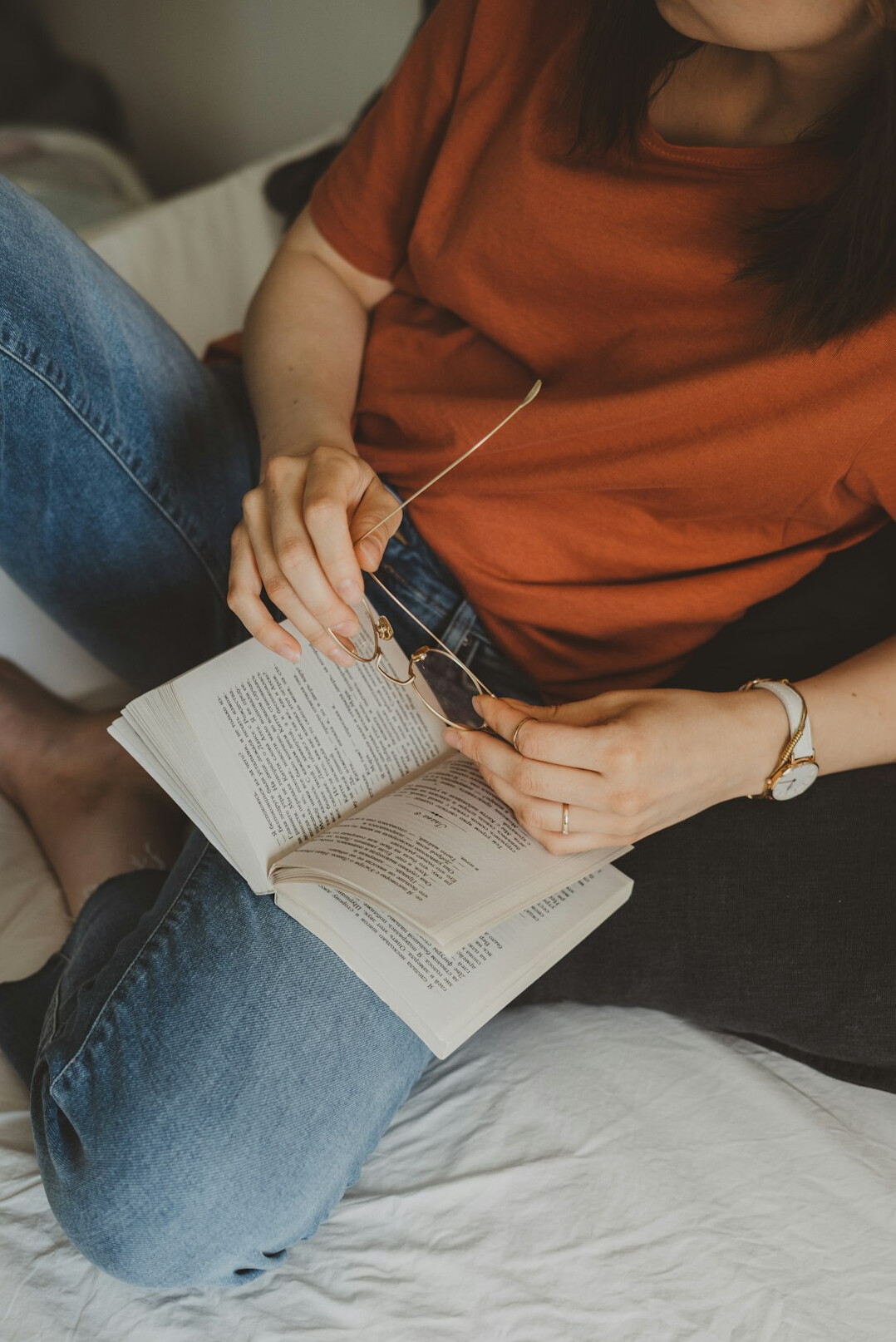 person reading finance book