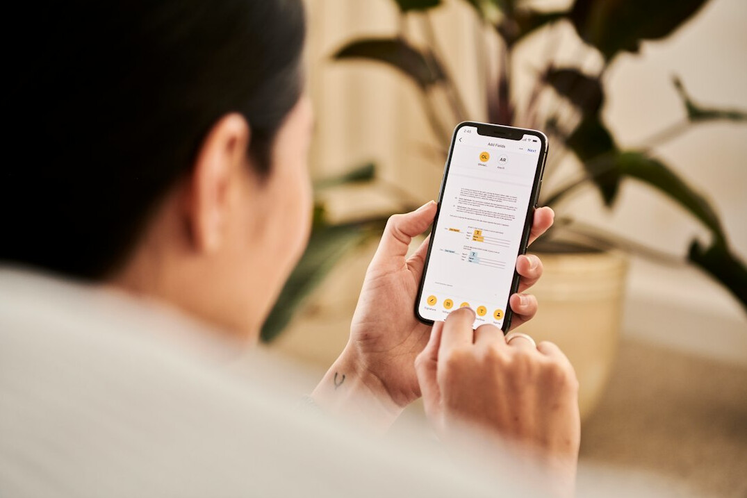 person checking investment app